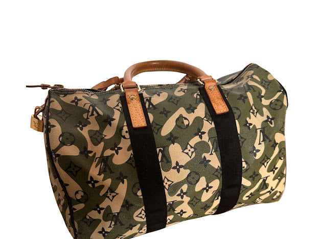 Louis Vuitton Camouflage luggage.